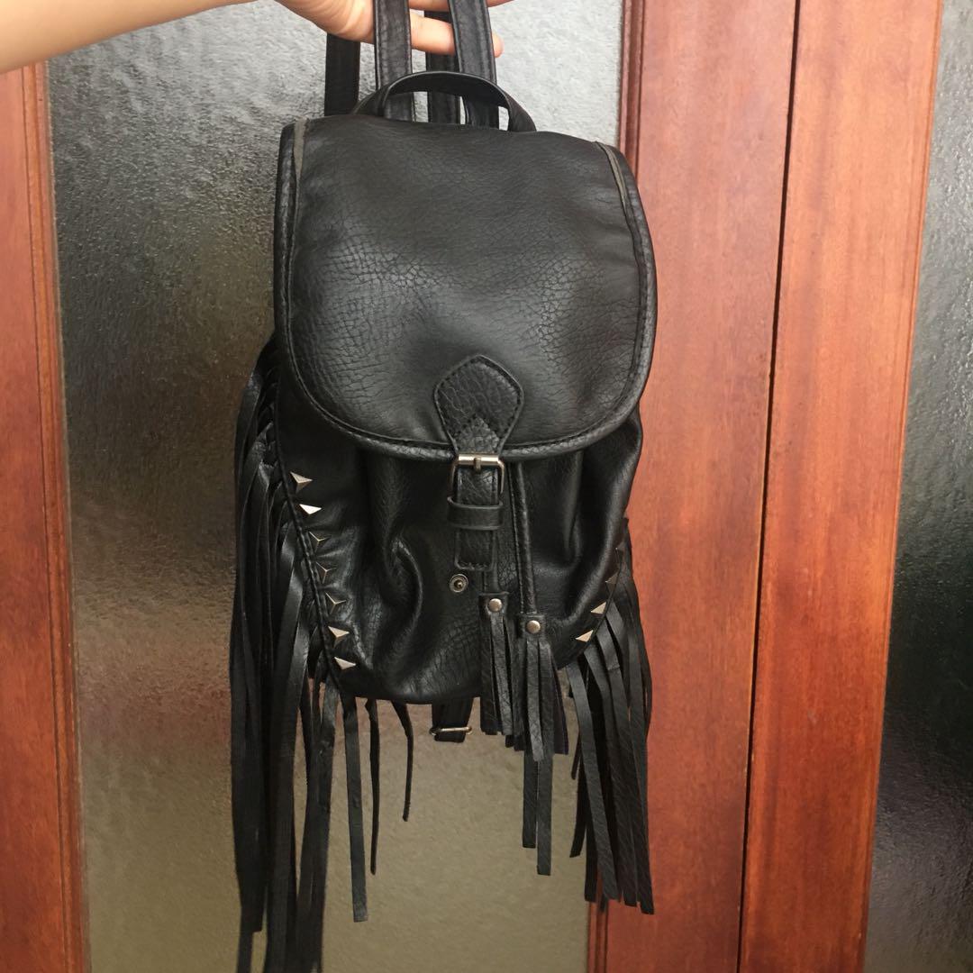 black fringe backpack