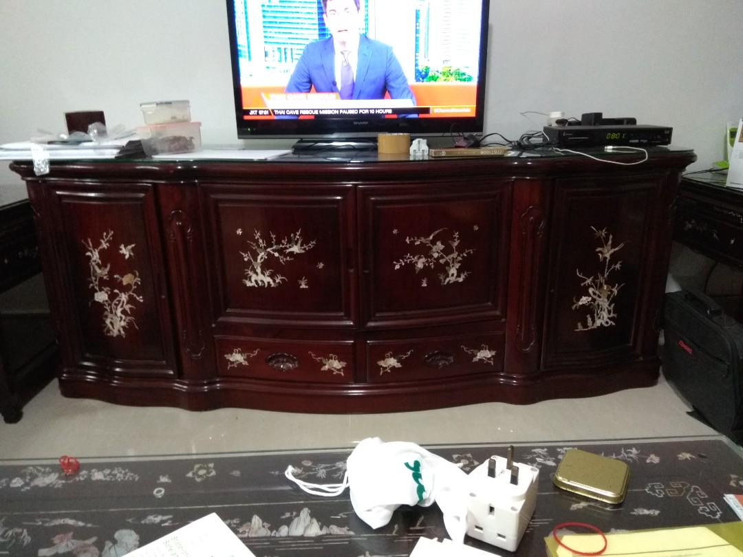 TV console (Category: TV Consoles) located in Singapore. Submitted by wongjan (Listing ID 178900749, Image 1). Description: A true antique! Made of rosewood with curved front which is very rare nowadays. Beautiful mother of pearl inlay. Has 4 doors and 2 drawers. In excellent condition! Cash and carry before 19/7 or it will be in warehouse till November..