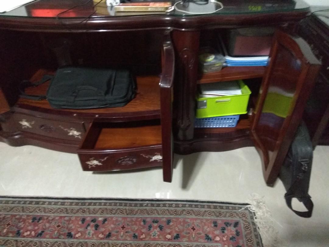 TV console (Category: TV Consoles) located in Singapore. Submitted by wongjan (Listing ID 178900749, Image 2). Description: A true antique! Made of rosewood with curved front which is very rare nowadays. Beautiful mother of pearl inlay. Has 4 doors and 2 drawers. In excellent condition! Cash and carry before 19/7 or it will be in warehouse till November..