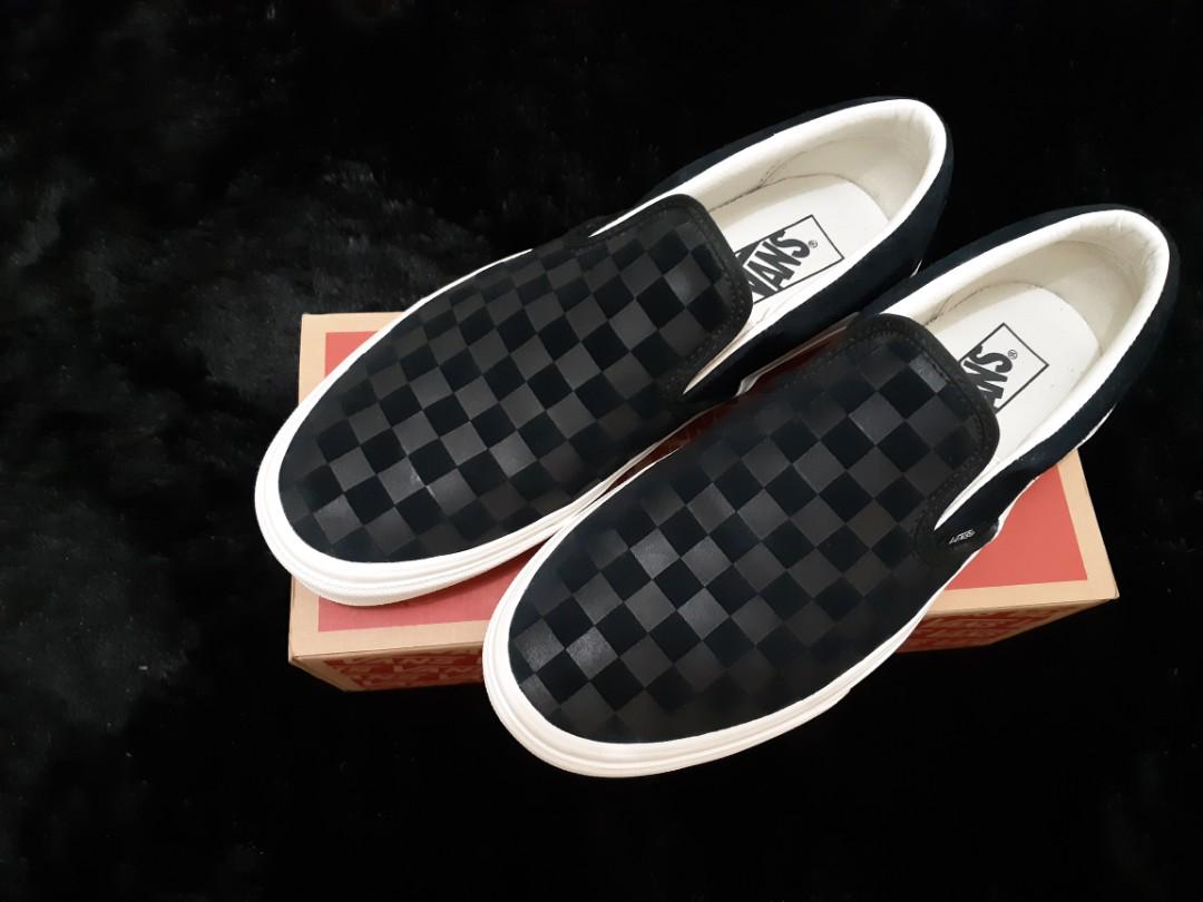 Vans slip on checker emboss sale
