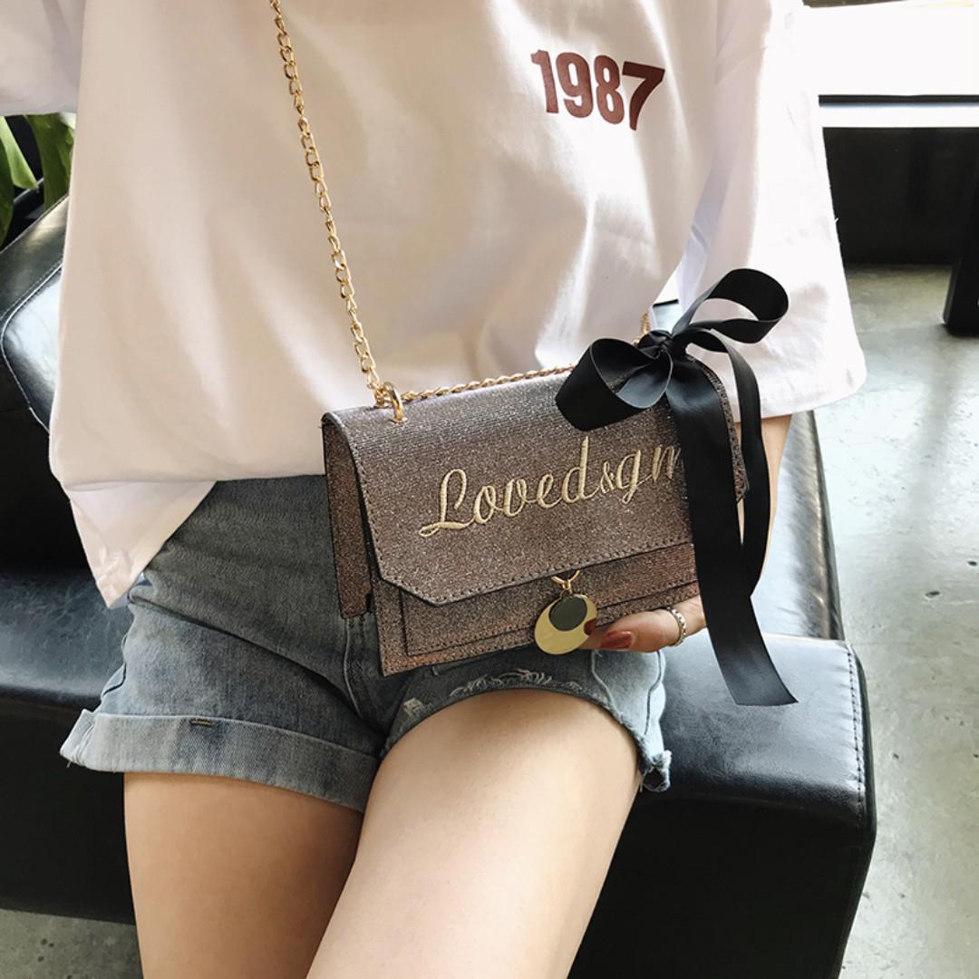 sling bag with chain handle