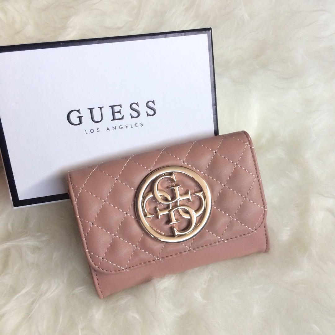 dompet guess