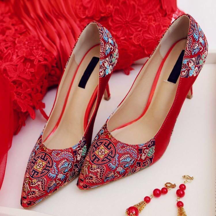 red embroidered heels