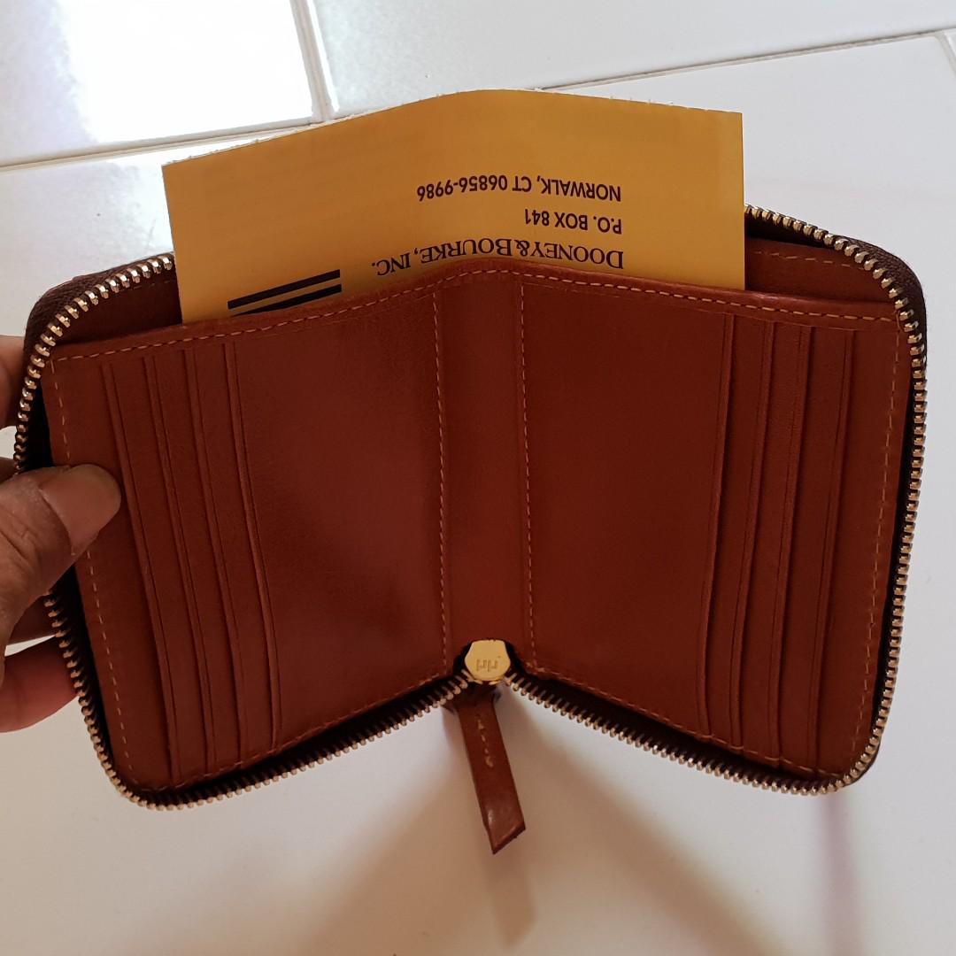 Dooney small hot sale zip around wallet