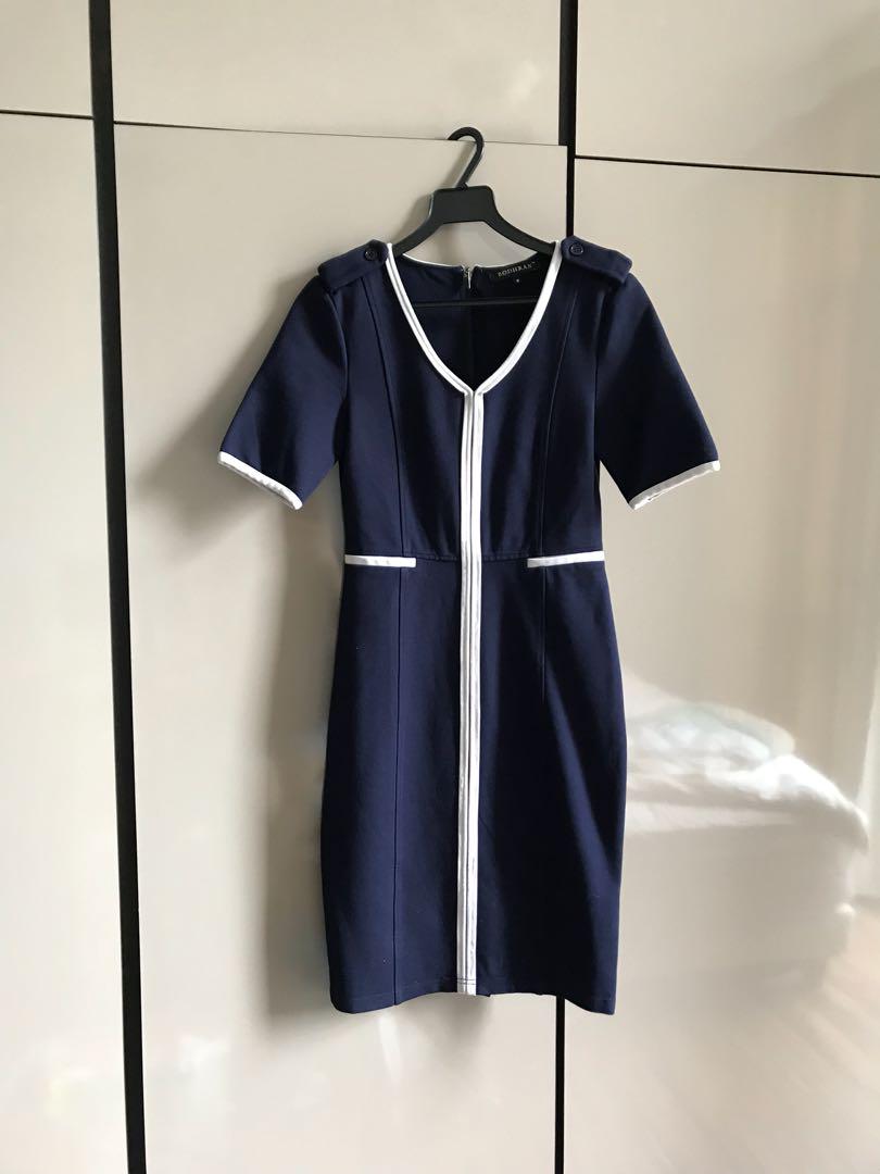 Navy blue dress with white top piping