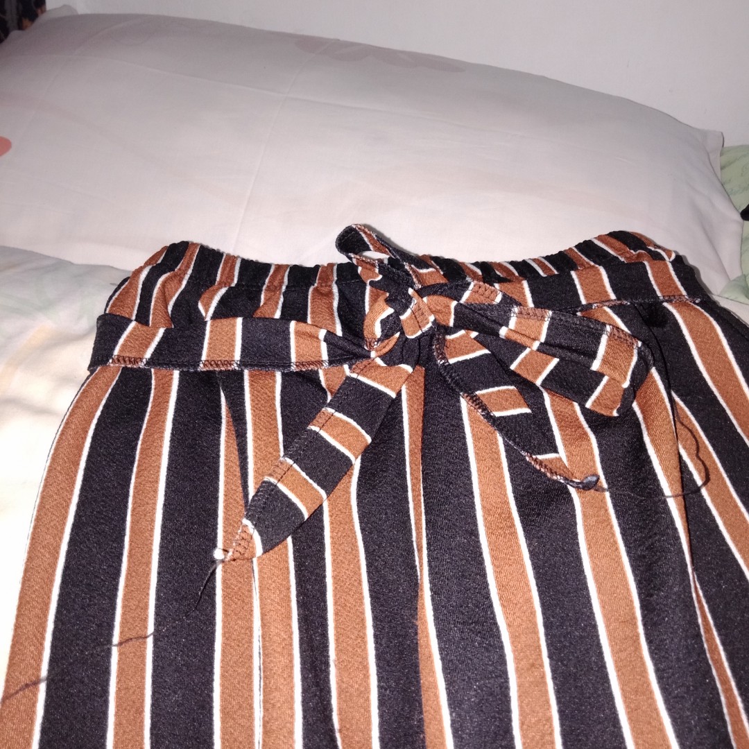 brown and black striped pants