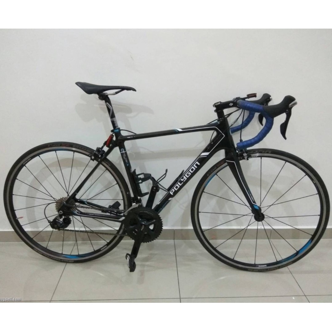 polygon road bike carbon