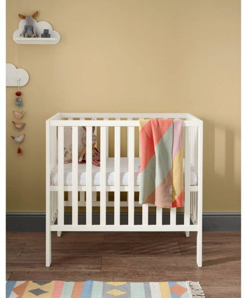 small white cot