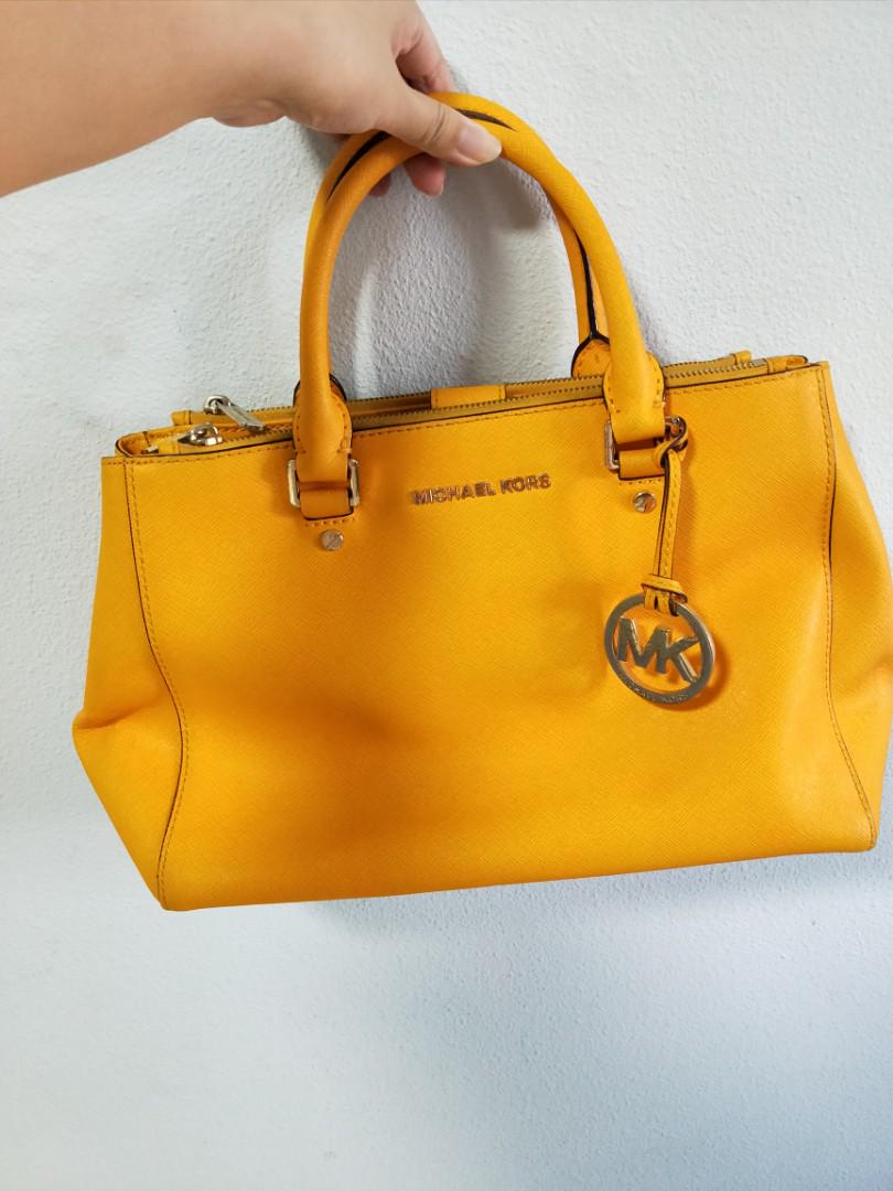 Michael Kors yellow handbag, Luxury, Bags & Wallets on Carousell