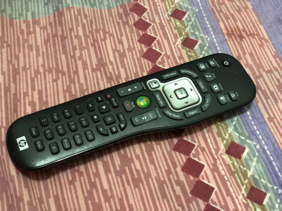 Remote control (Category: Entertainment Systems & Smart Home Devices) located in Singapore. Submitted by ecepe16 (Listing ID 180105713, Image 1). Description: Remote control for media center, ex desktop HP Pavillion 6089D.