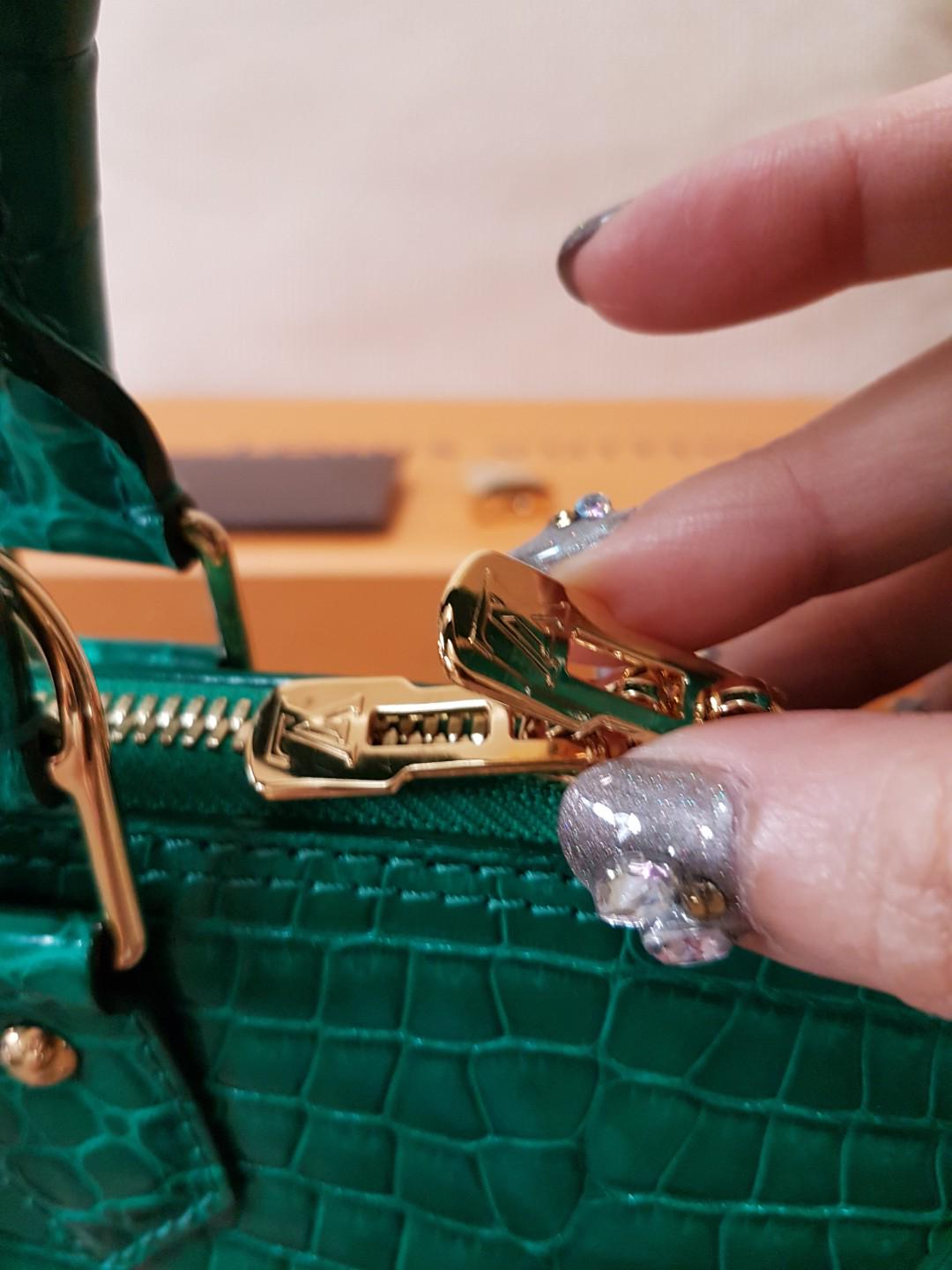 A SHINY ÉCAILLE ALLIGATOR ALMA BB WITH GOLD HARDWARE