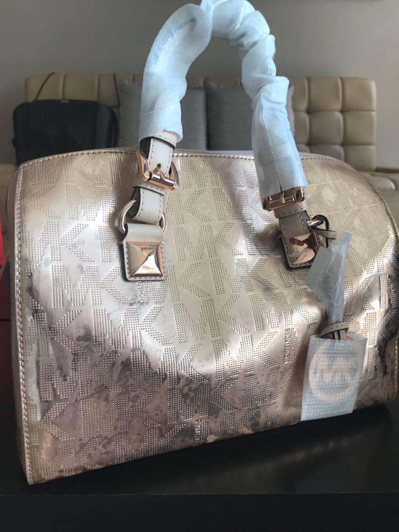 Michael kors rose gold handbag hot sale