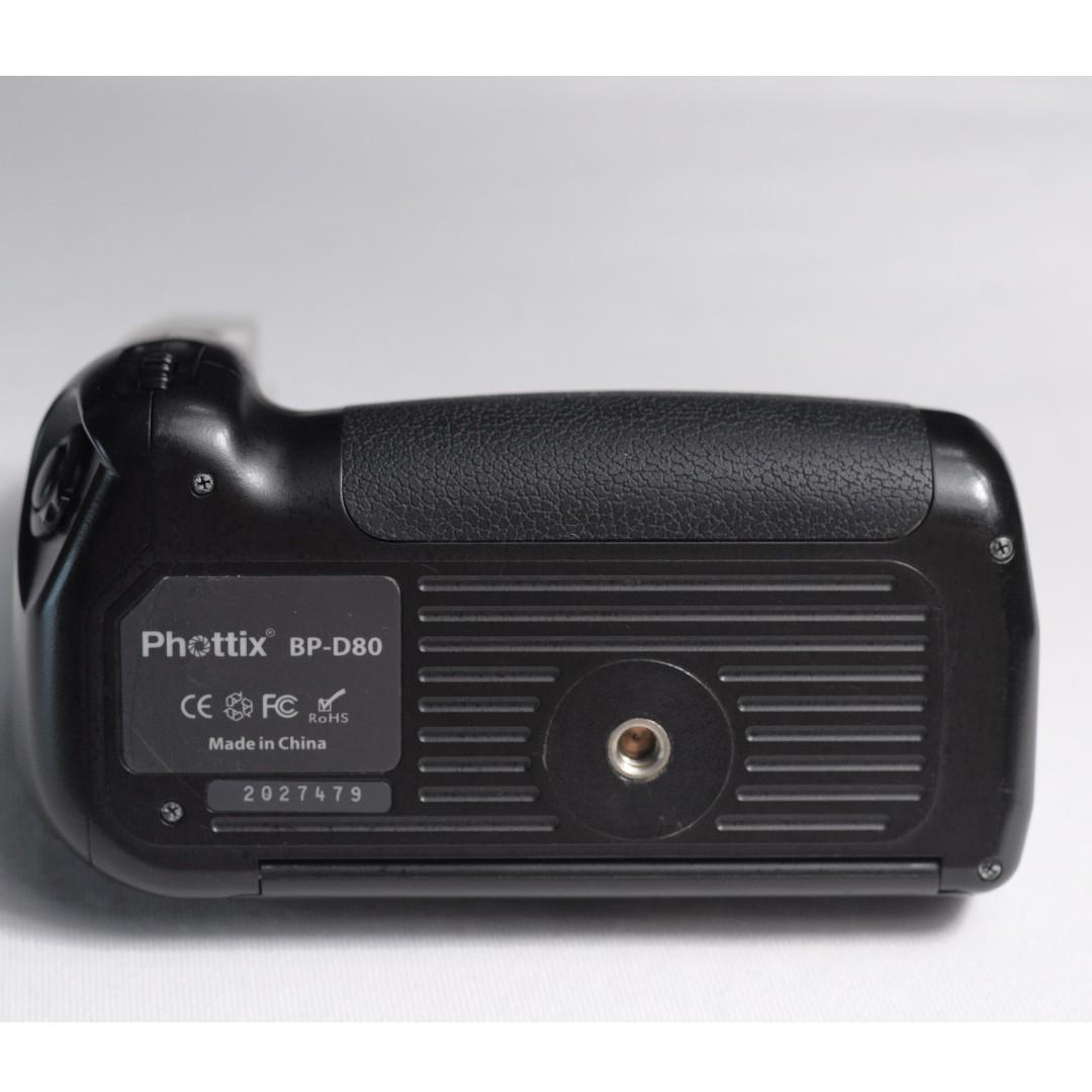 Phottix BP-D80 Battery Grip for Nikon D90/D80 (Category: Batteries & Chargers) located in Manila. Submitted by 12121221 (Listing ID 180737483, Image 2). Description: Working Condition Rarely Used Includes 6AA Battery adapter Issue: The pin used to lock the battery door is loose. It can be repaired but I use tape instead. (Shown on Photo) Negotiable .