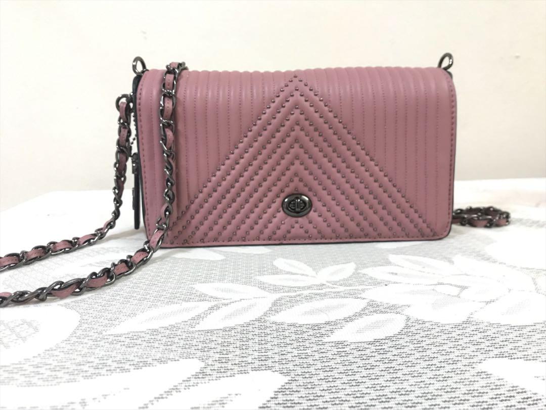 Coach shop dinky rivets