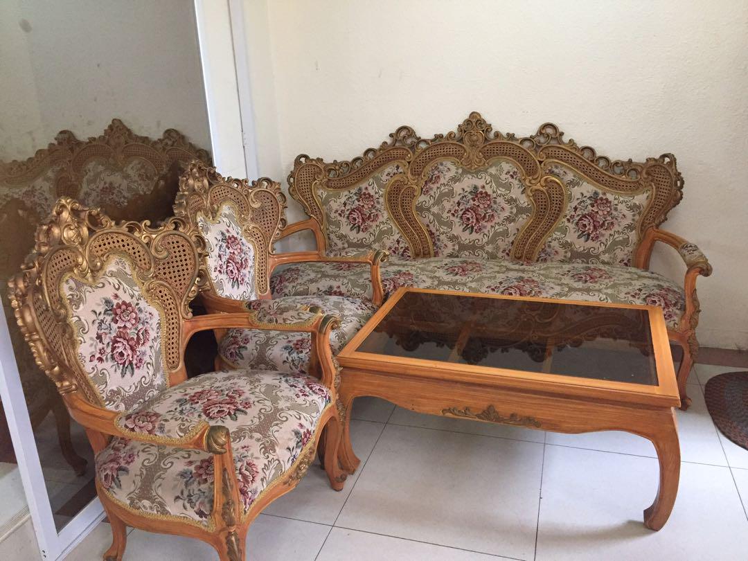 Classic Sofa Set (Category: Sofas) located in Bulacan. Submitted by mark88821 (Listing ID 181012829, Image 1). Description: SOFA SET with one long sofa and 2 single sofa and with a center table wWith intricate details and carvings Great as center piece for houses Price still negotiable send me a message Thanks.