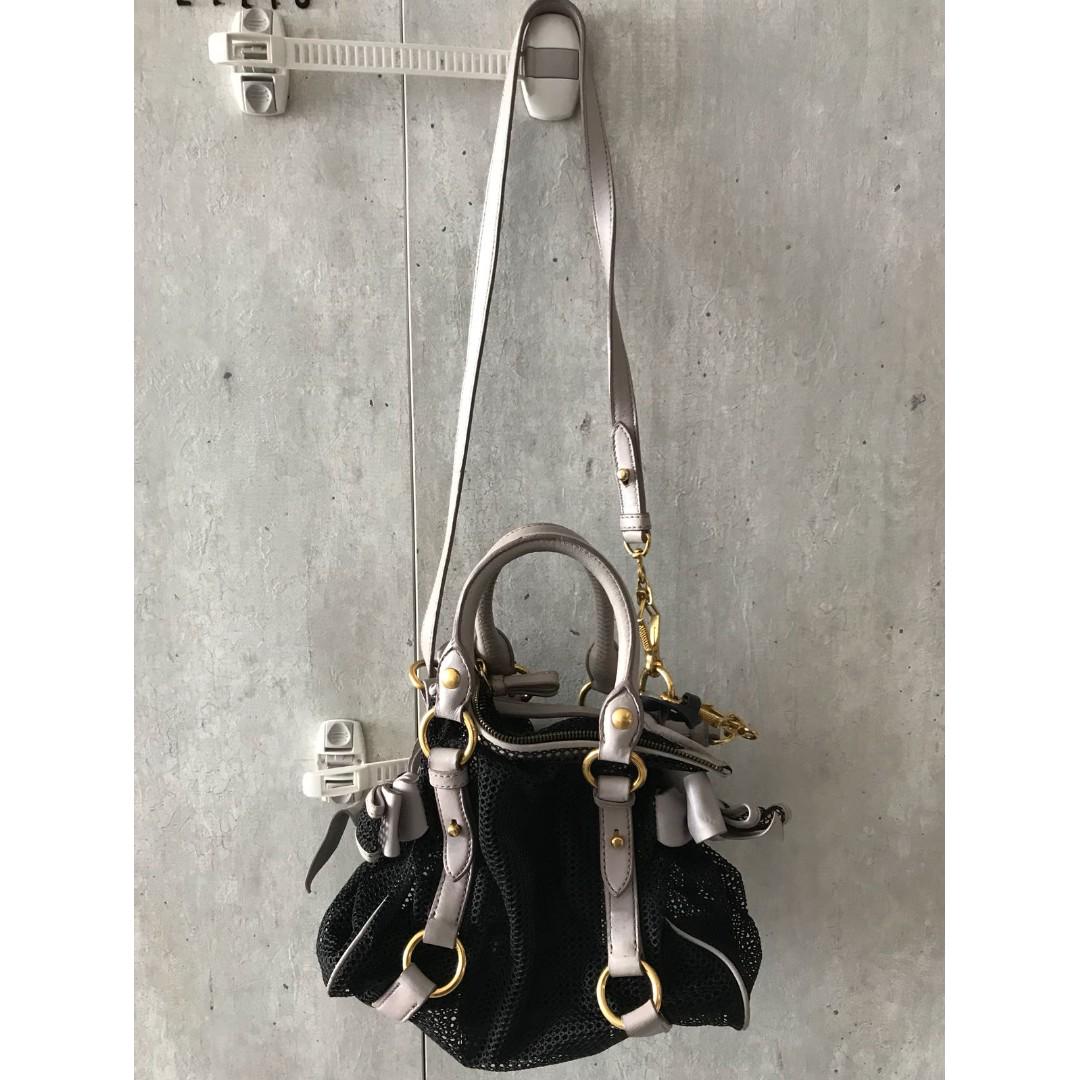 Miu miu mini bow bag, Luxury, Bags & Wallets on Carousell