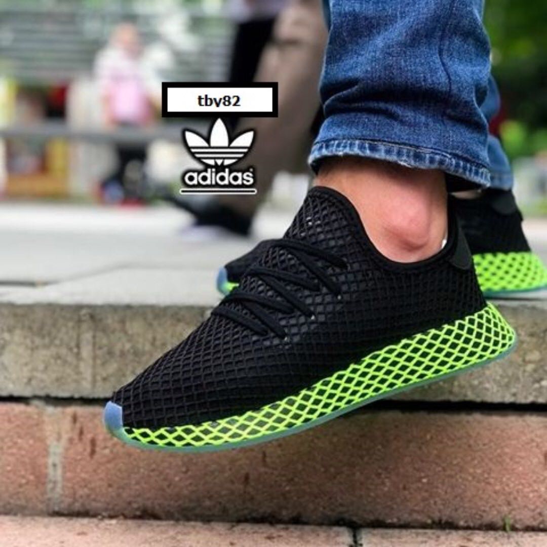 black and neon green adidas shoes