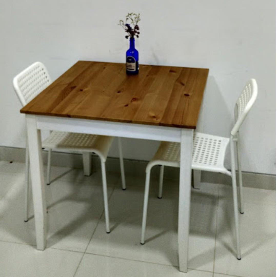 table ikea lehrman and two chairs