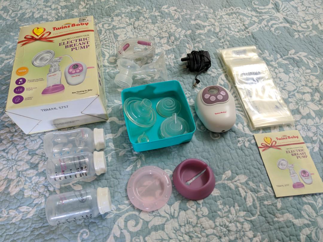 Breast pump top for twins