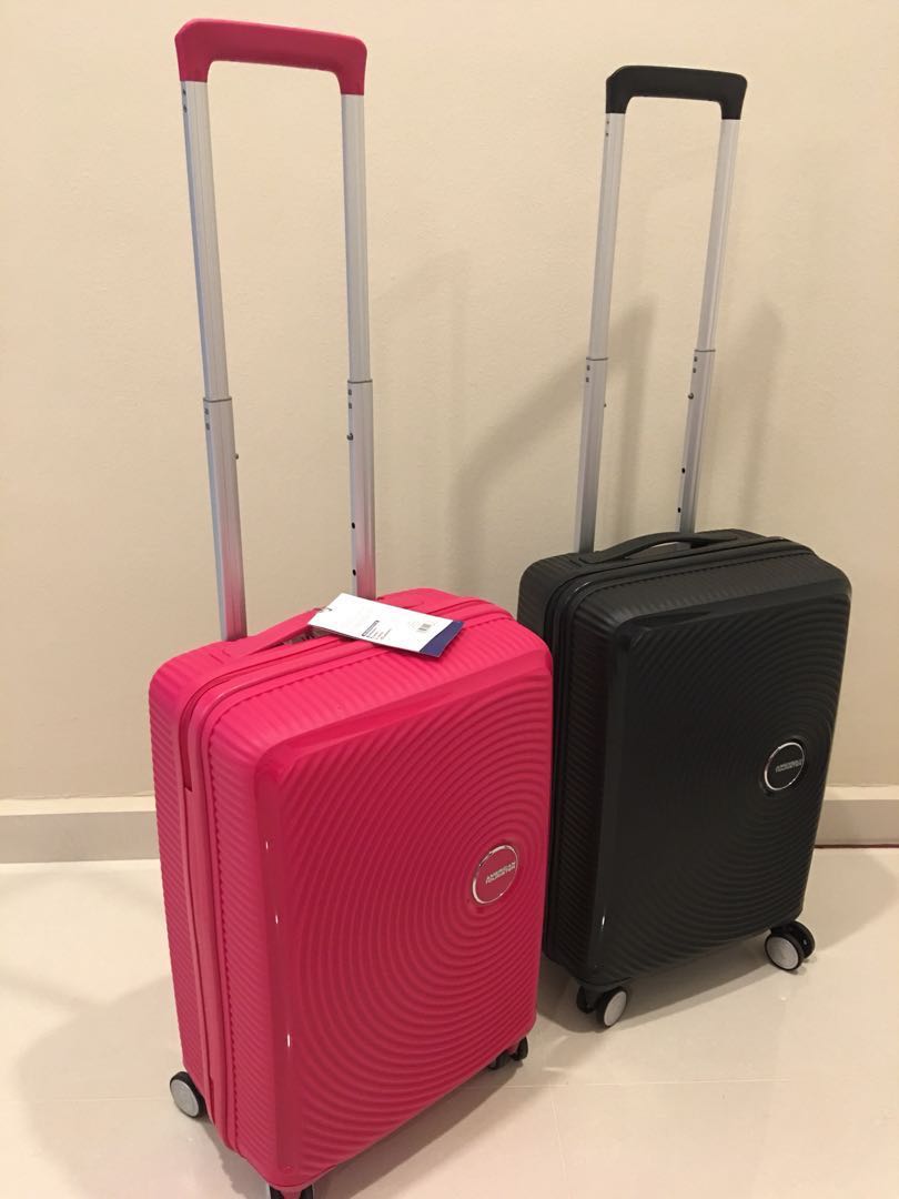 pink american tourister