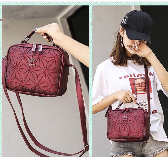 Adidas x issey miyake sling hotsell bag