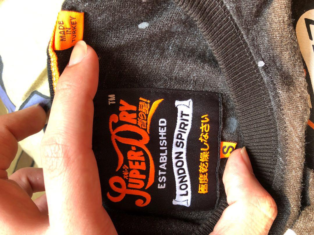 Superdry (Category: Shirts) located in Singapore. Submitted by hahlol (Listing ID 181914902, Image 4). Description: Got it as a gift but size too small for me. $83 for the black one and $78 for the blue one or take both for the price of $150!! (These are bought from HongKong).