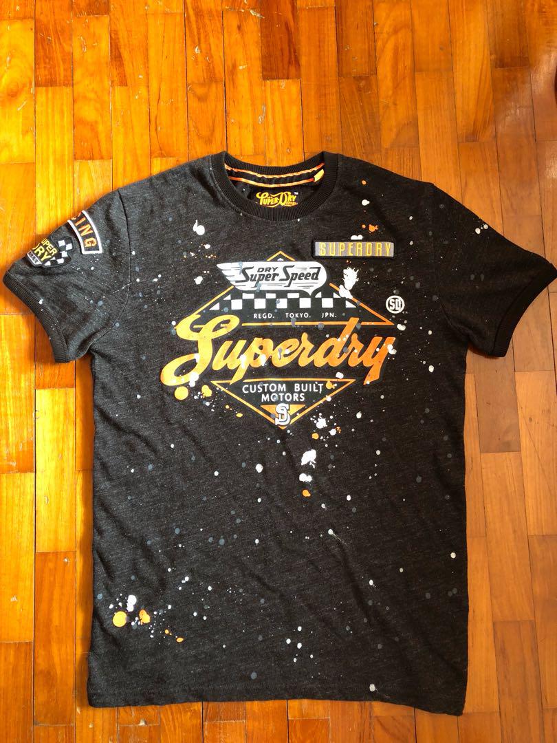 Superdry (Category: Shirts) located in Singapore. Submitted by hahlol (Listing ID 181914902, Image 3). Description: Got it as a gift but size too small for me. $83 for the black one and $78 for the blue one or take both for the price of $150!! (These are bought from HongKong).