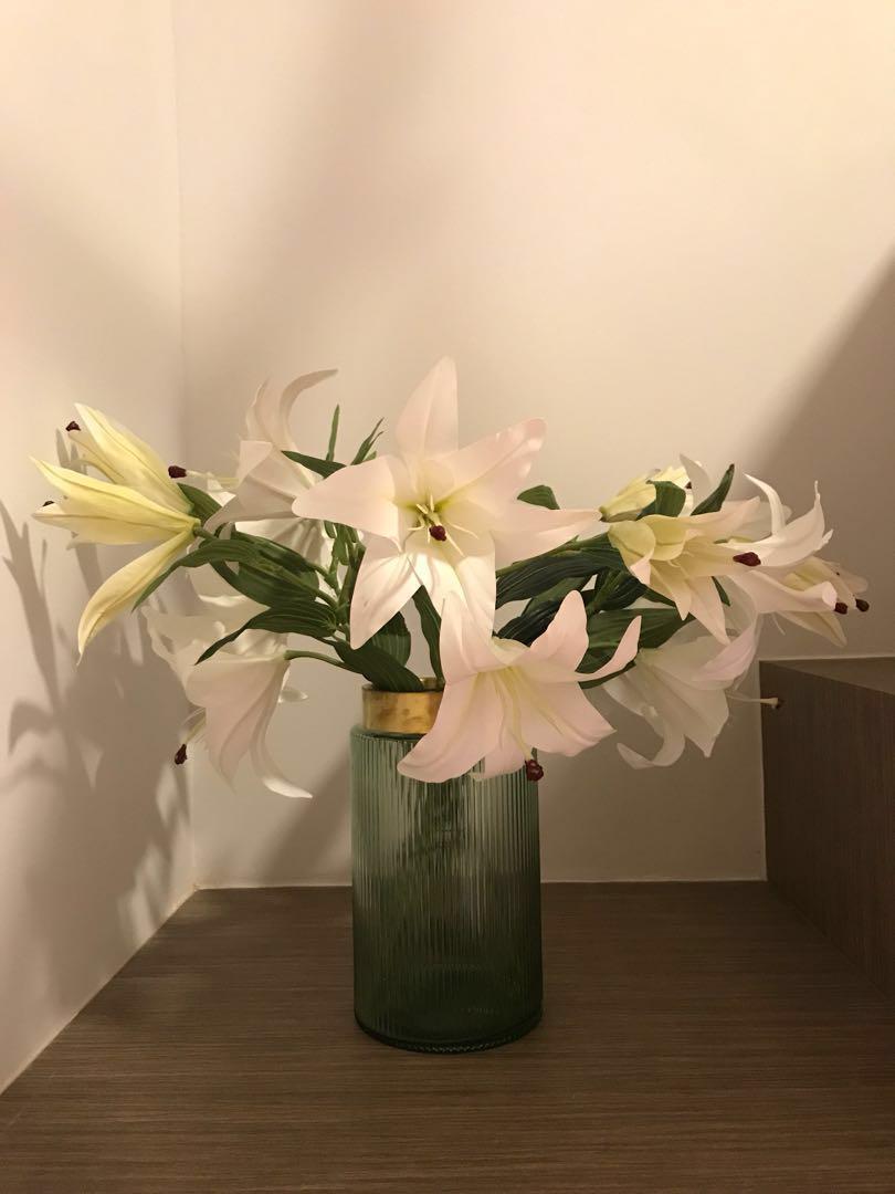 fake lilies in vase