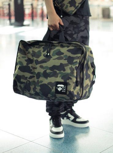 A bathing ape side bag green camo.