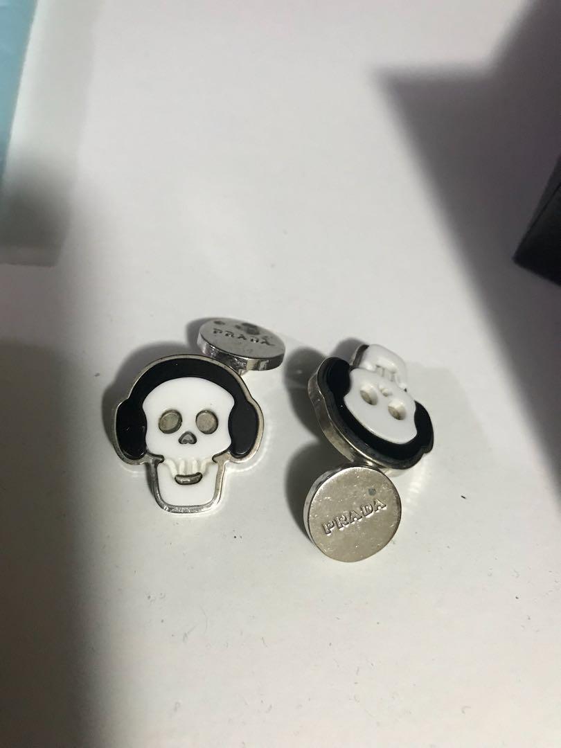Prada cufflink (Category: Shirts) located in Singapore. Submitted by wykb (Listing ID 181436921, Image 2). Description: BRAND NEW 100%,authentic Prada skull cuff links. Price nego upon meeting up only. Mobile 81234066 .