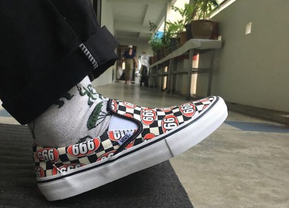 vans x supreme slip on