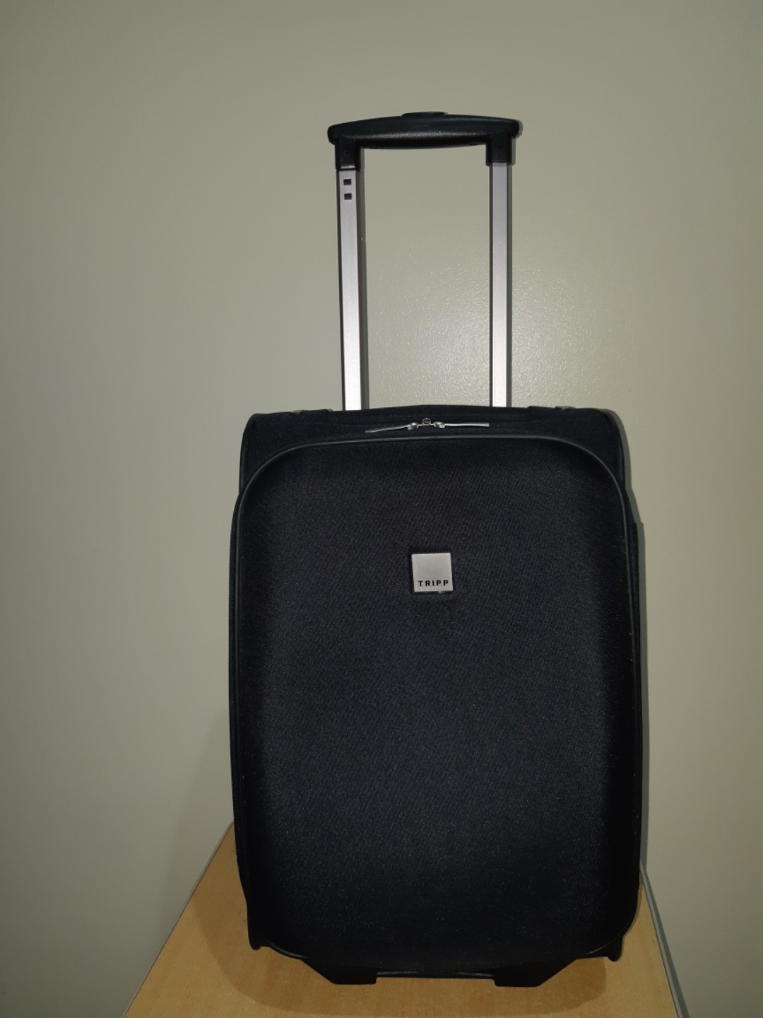 tripp black suitcase