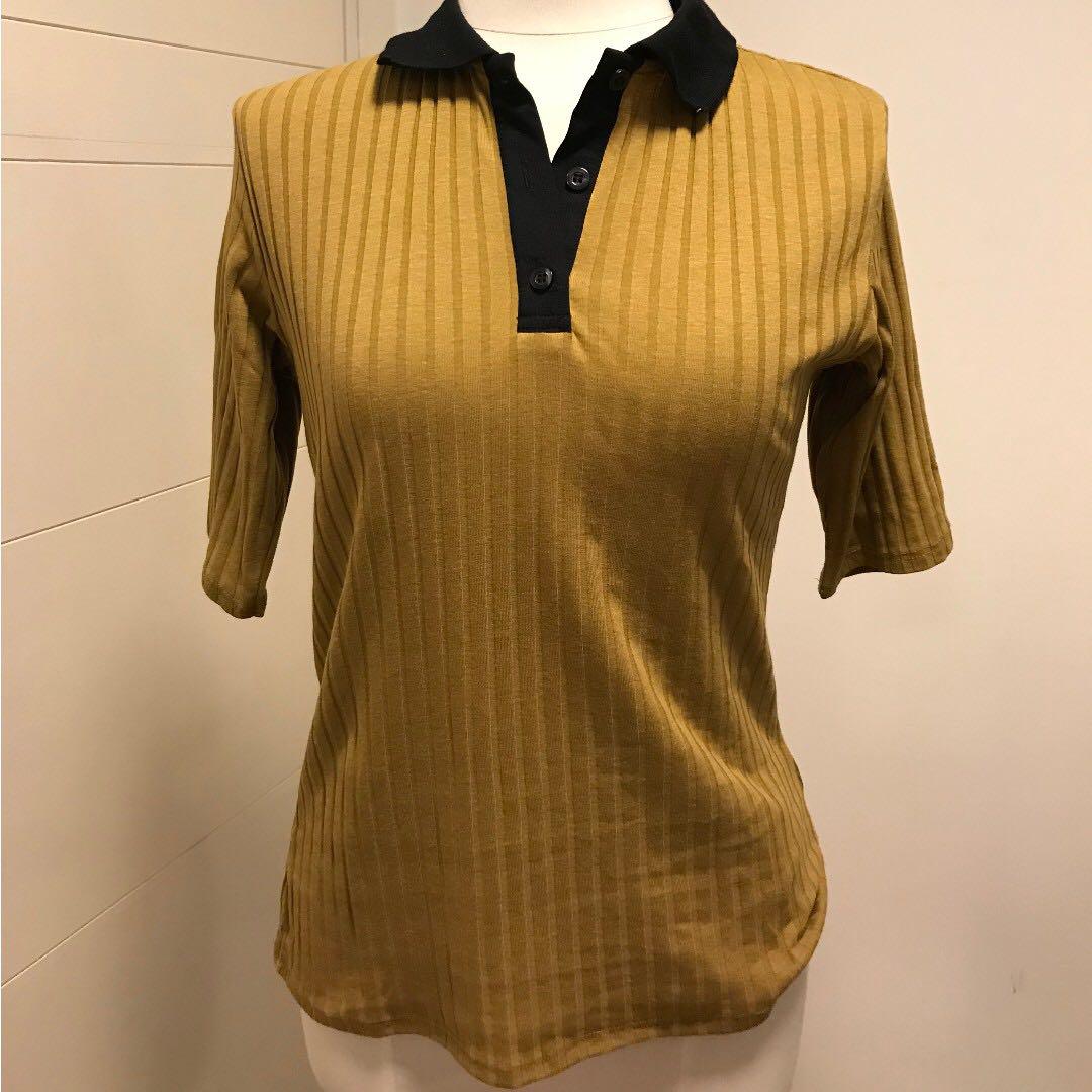 mustard yellow polo shirt