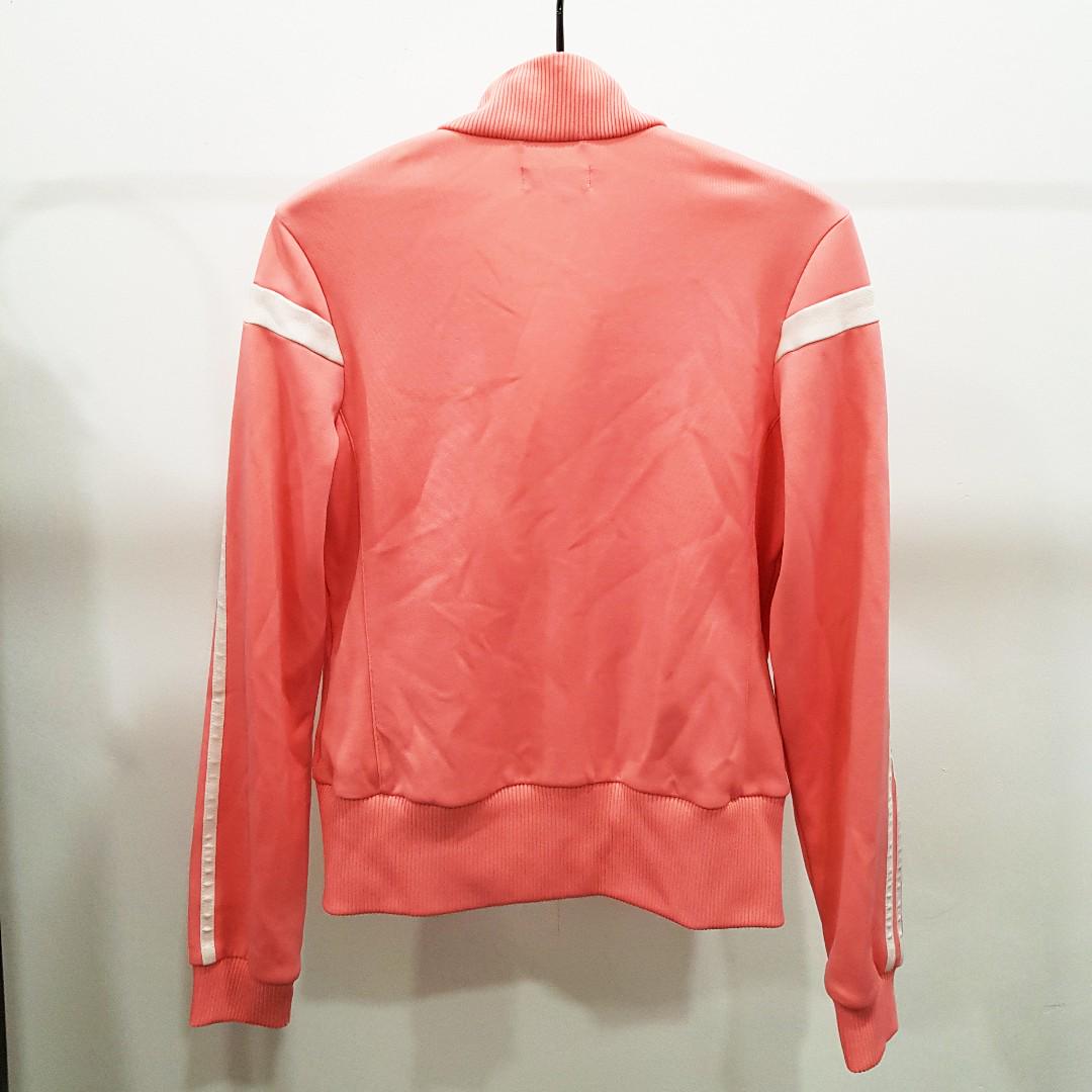Adidas Original Vintage Track Jacket (Category: Coats, Jackets and Outerwear) located in Singapore. Submitted by amandarhling (Listing ID 182543428, Image 3). Description: Salmon pink colour. The size stated is a 40 but in my opinion its more fitting and fits a 36 (loosely) and a 38 (just nice).