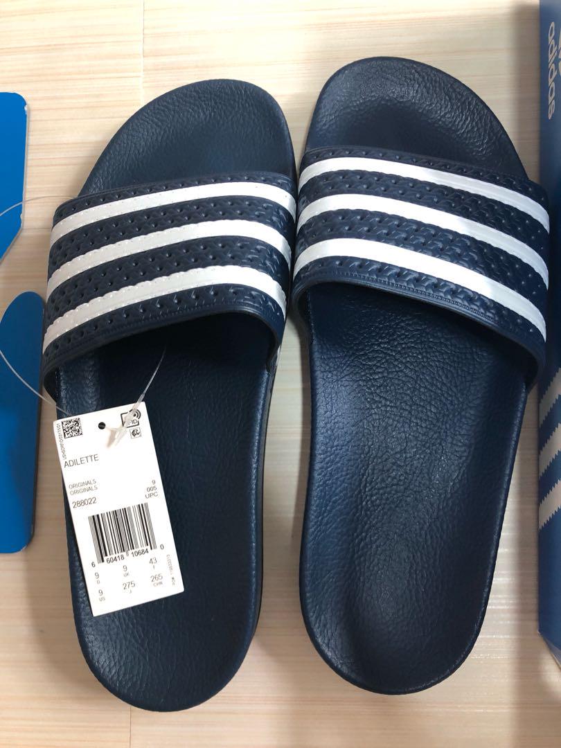 dark blue adidas slides