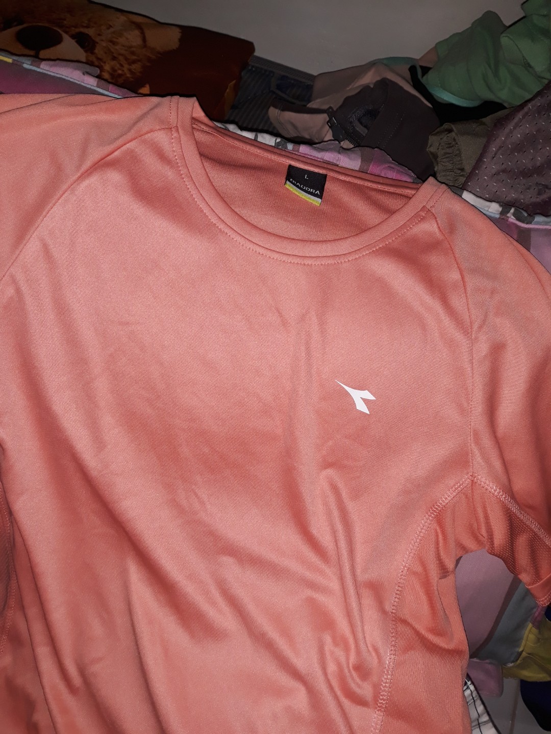 Kaos running hot sale diadora