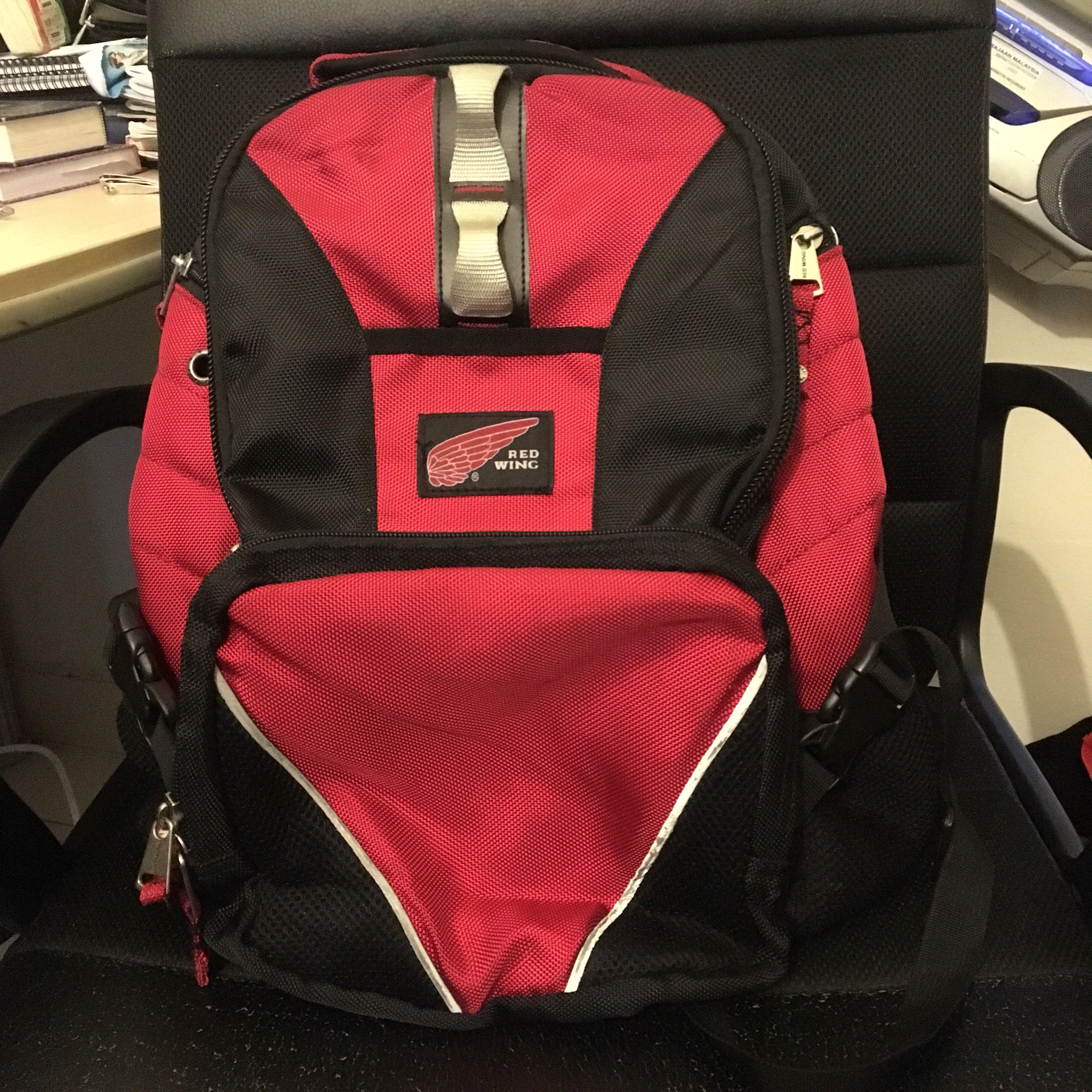 Red outlet wing backpack
