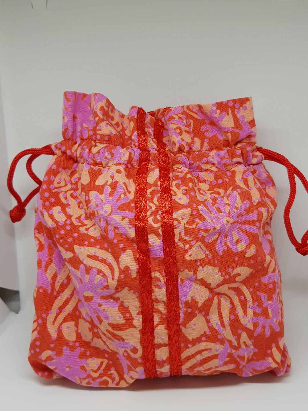 Batik pouch, Women's Fashion, Bags & Wallets, Purses & Pouches on Carousell