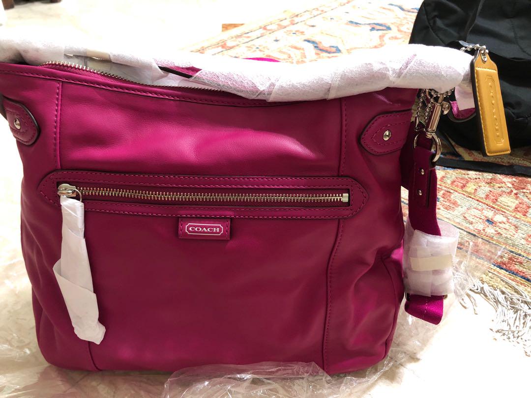 magenta coach purse