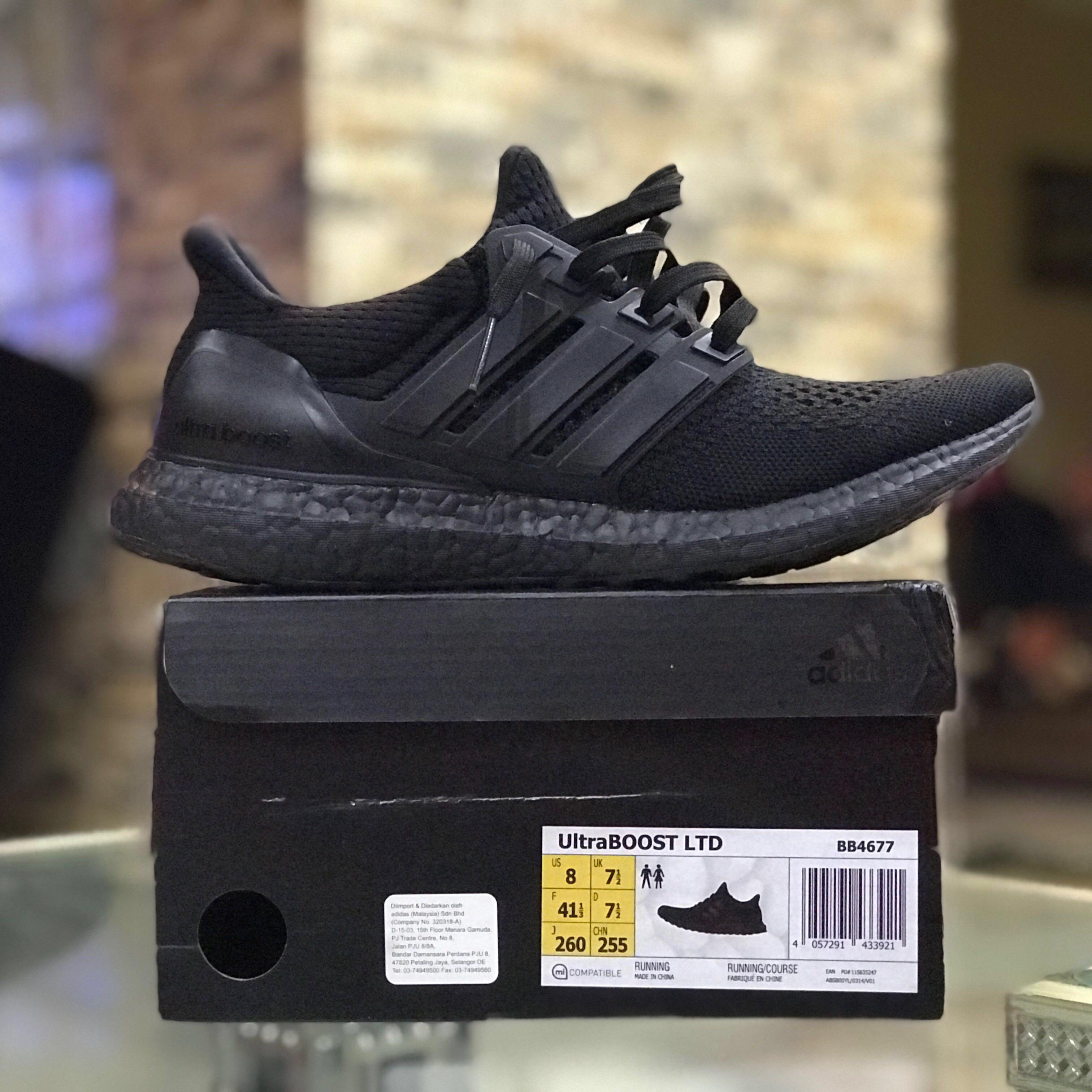 Adidas ultra boost triple black olx best sale