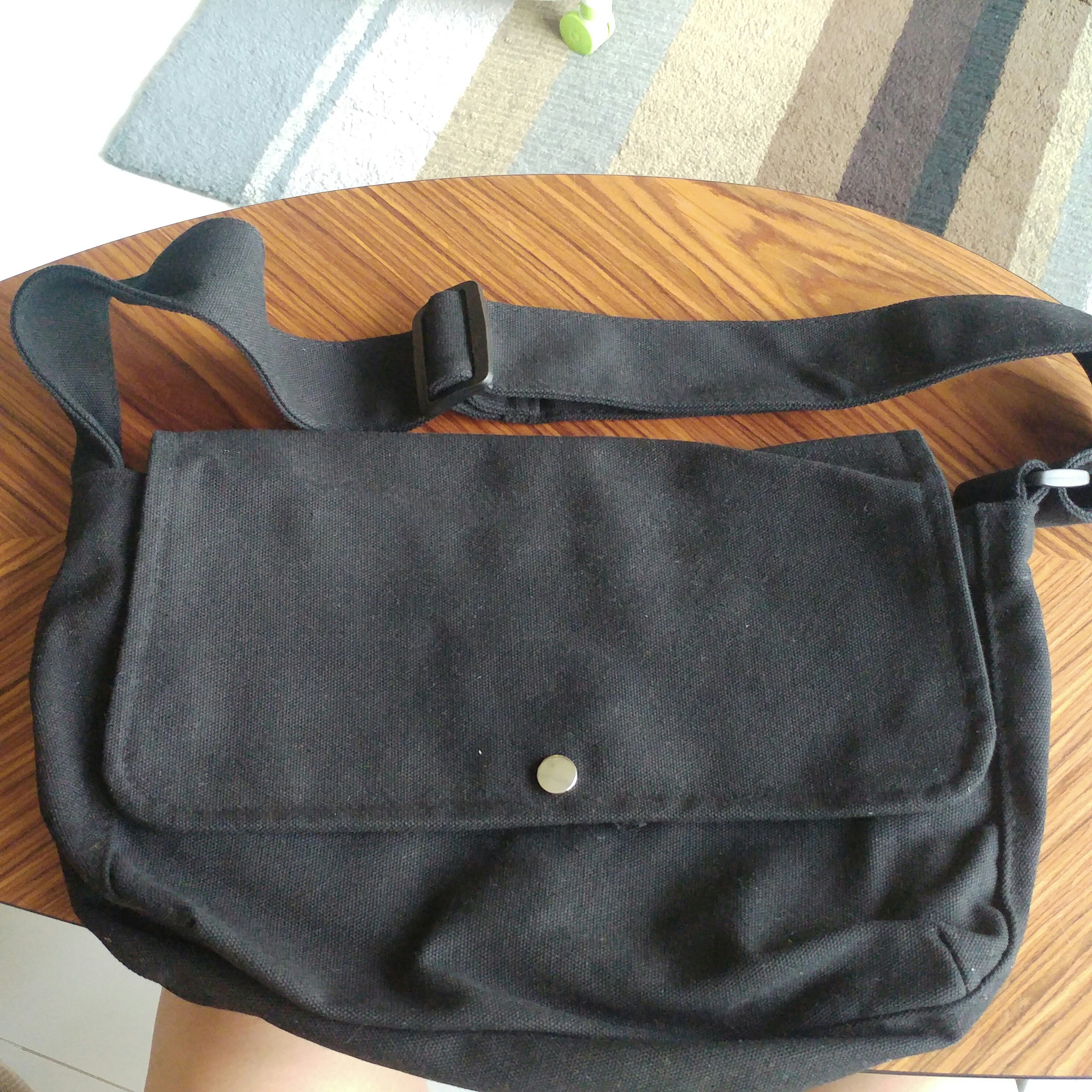 Black canvas sling bag clearance