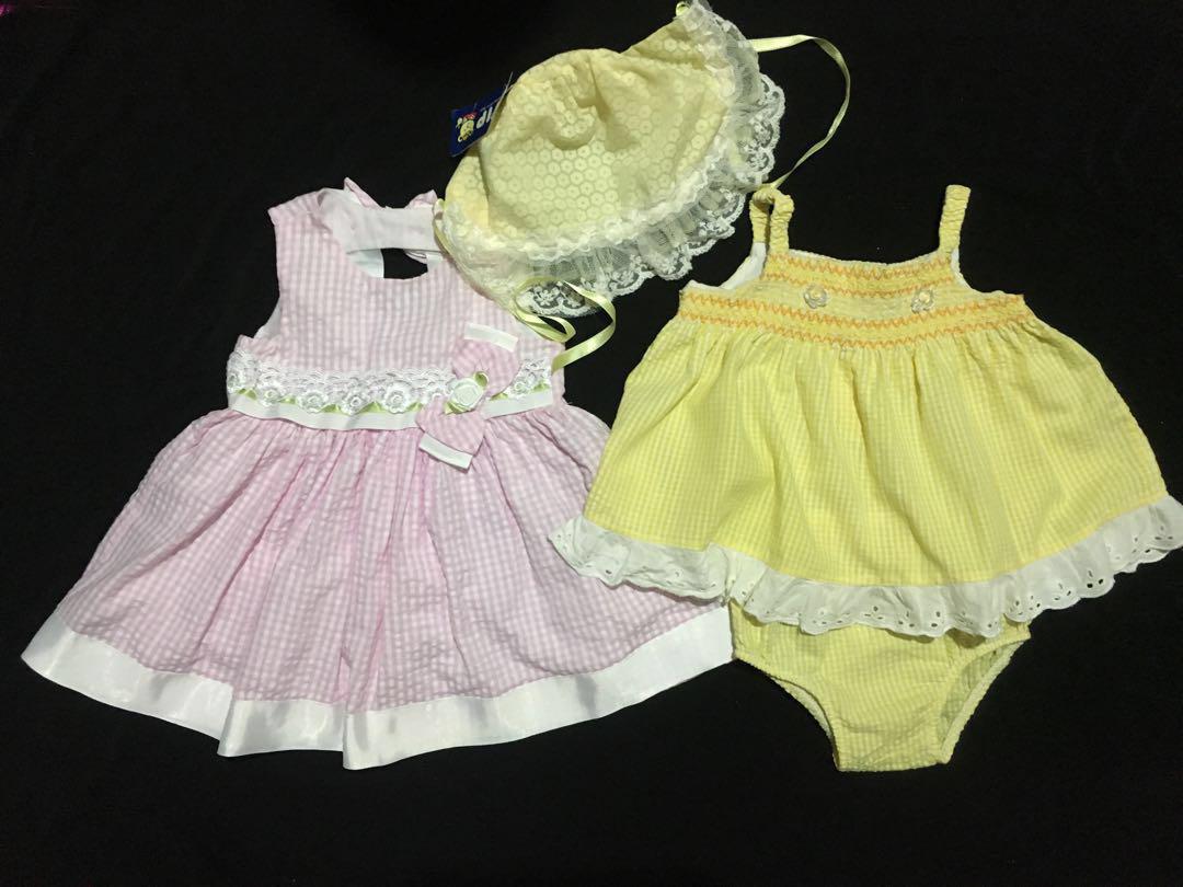 Pink & Yellow Checkered Baby Dress with Hat Bundle (Category: Babies & Kids Fashion) located in Manila. Submitted by rohsga (Listing ID 183299152, Image 1). Description: Pink Checkered Dress with matching checkered undies Size: 6-9mos but could fit up to 12mos Yellow Checkeres Dress Size 6-9mos Yellow Hat - NEW with TAG Price: 240 pesos #caroubundle.