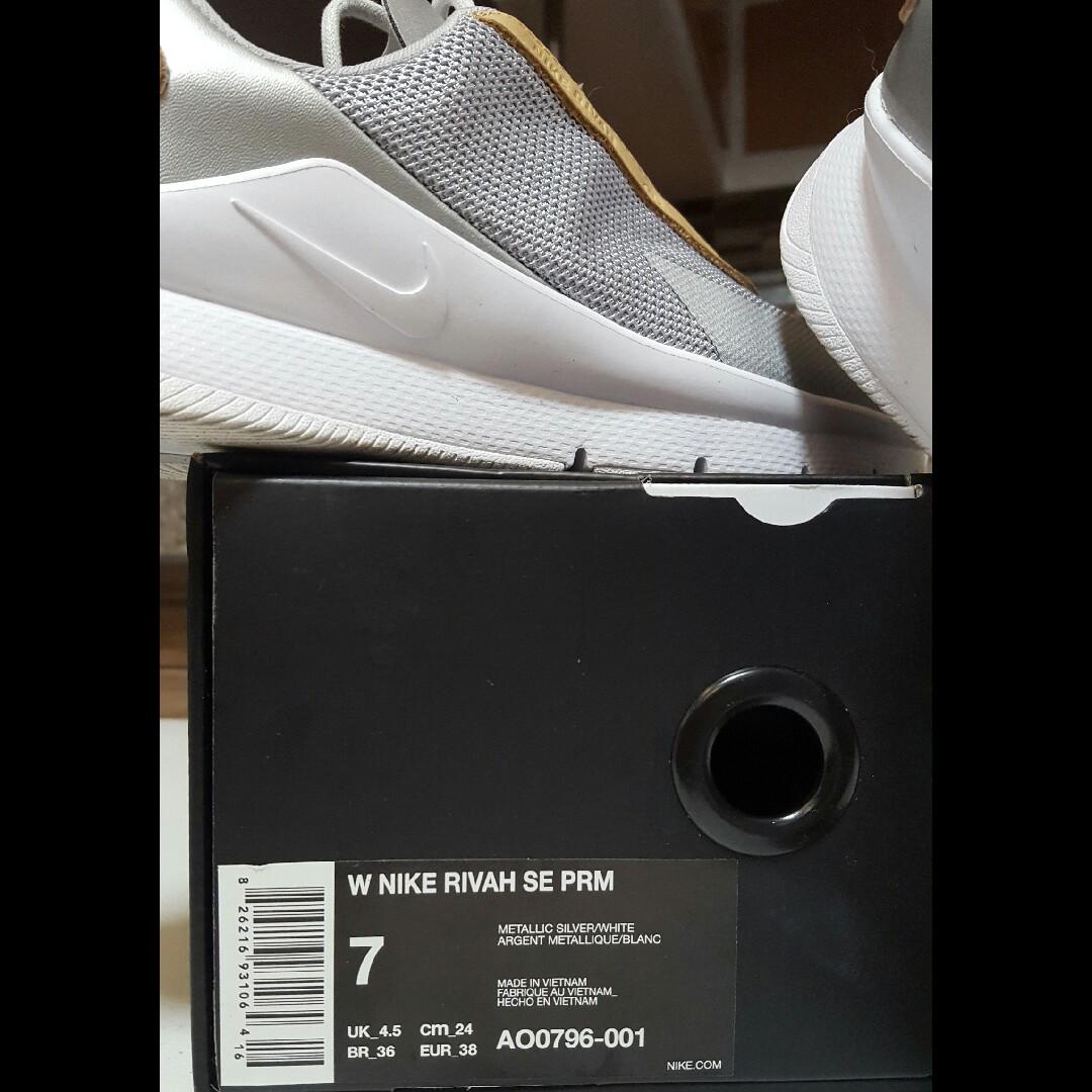 Nike rivah australia top