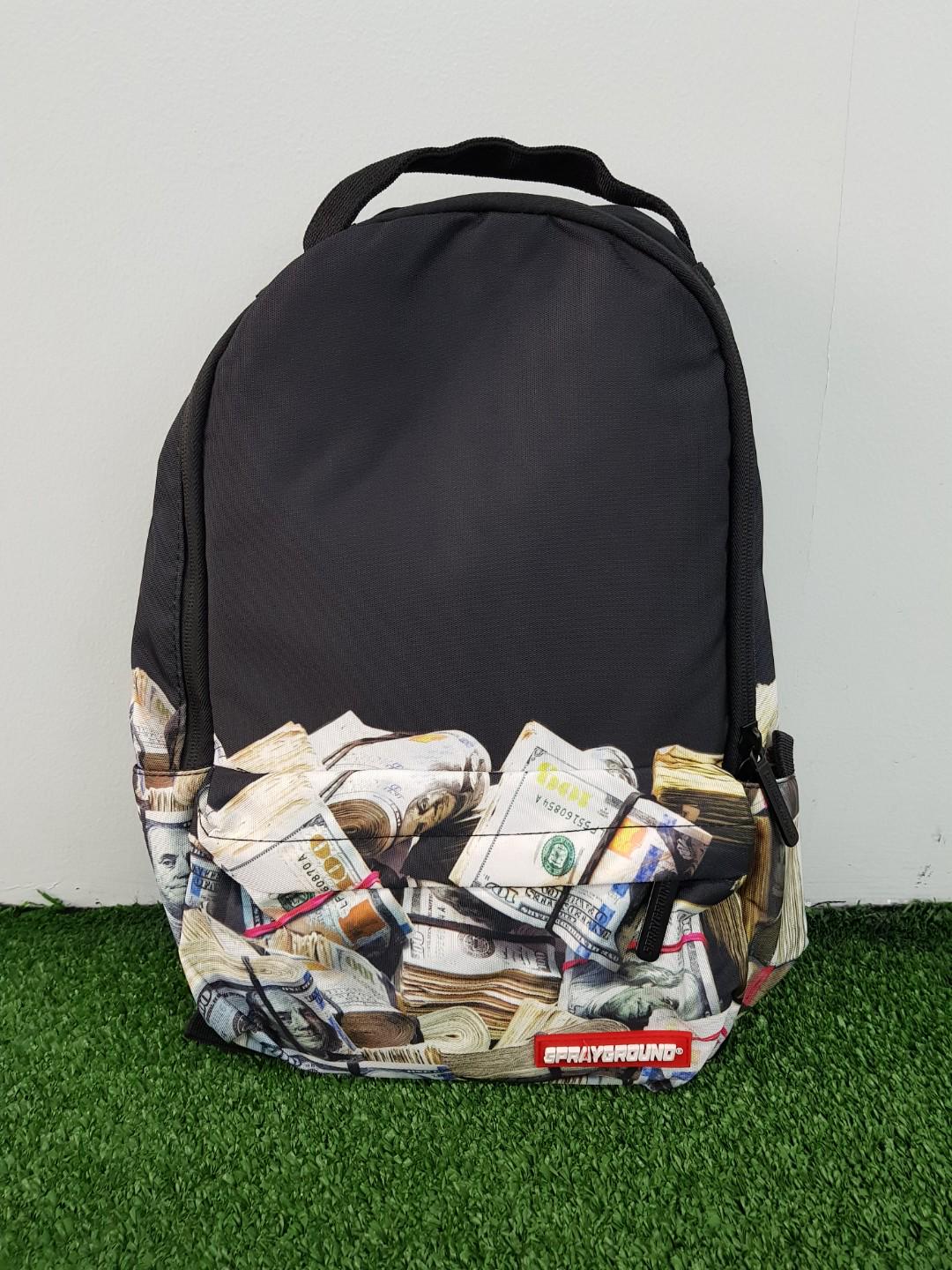 sprayground money rolled backpack