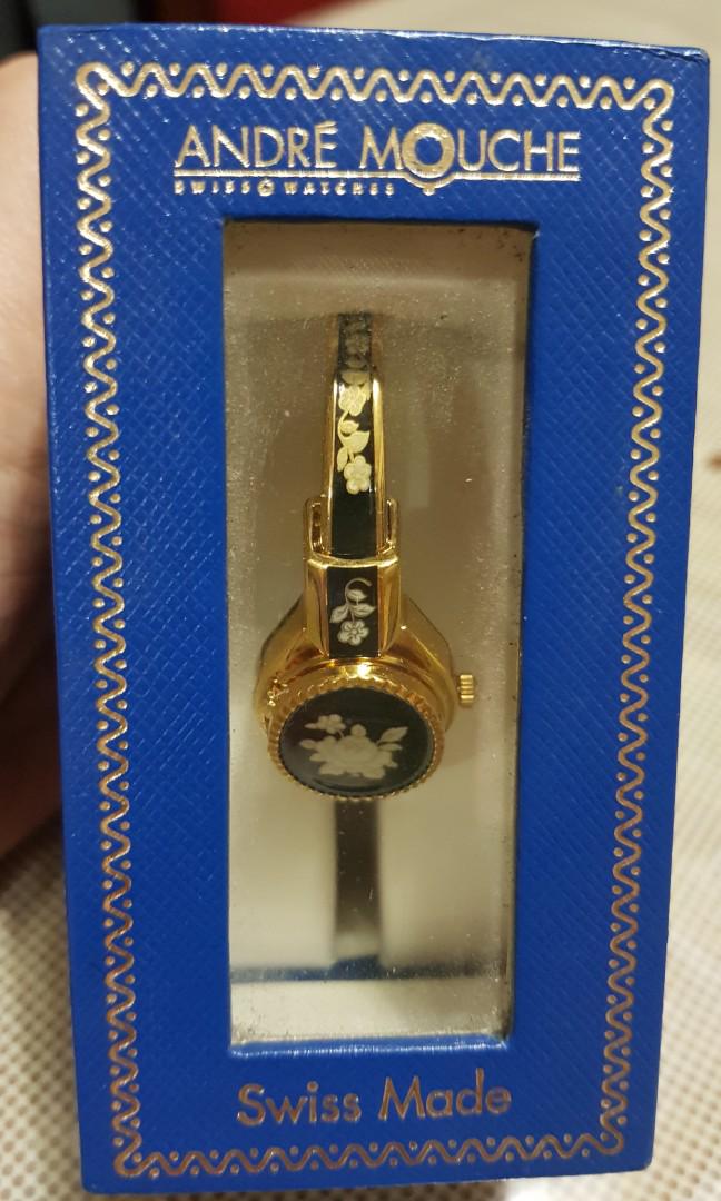 Andre mouche watch price store