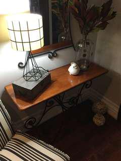 Console table with black cast iron legs and mirror. Excellent condition