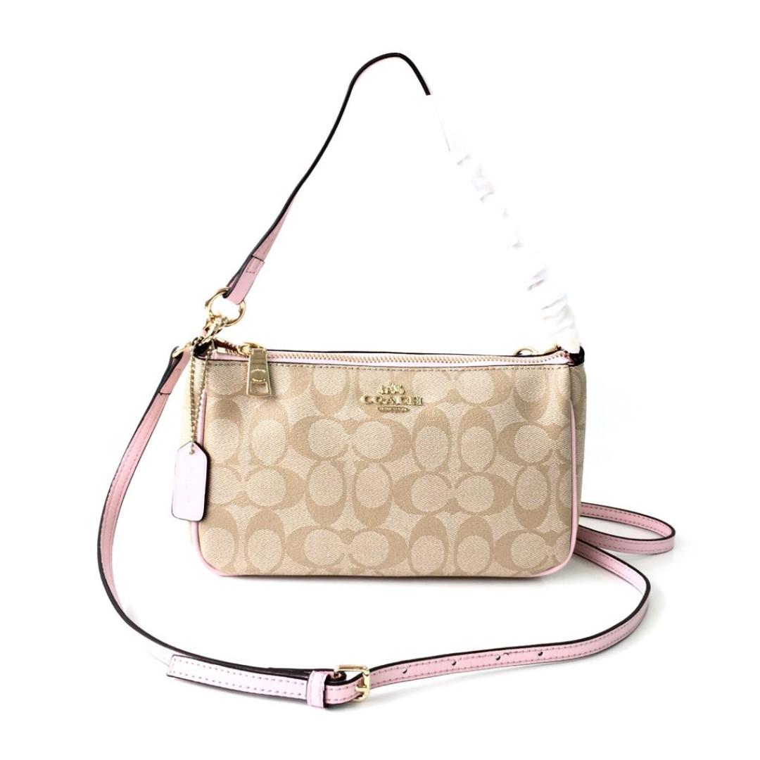 Coach top handle pouch in signature hot sale