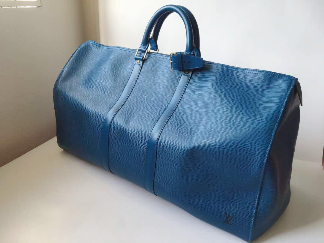 Authentic Louis Vuitton Blue Epi Leather Keepall 55, Luxury, Bags & Wallets  on Carousell