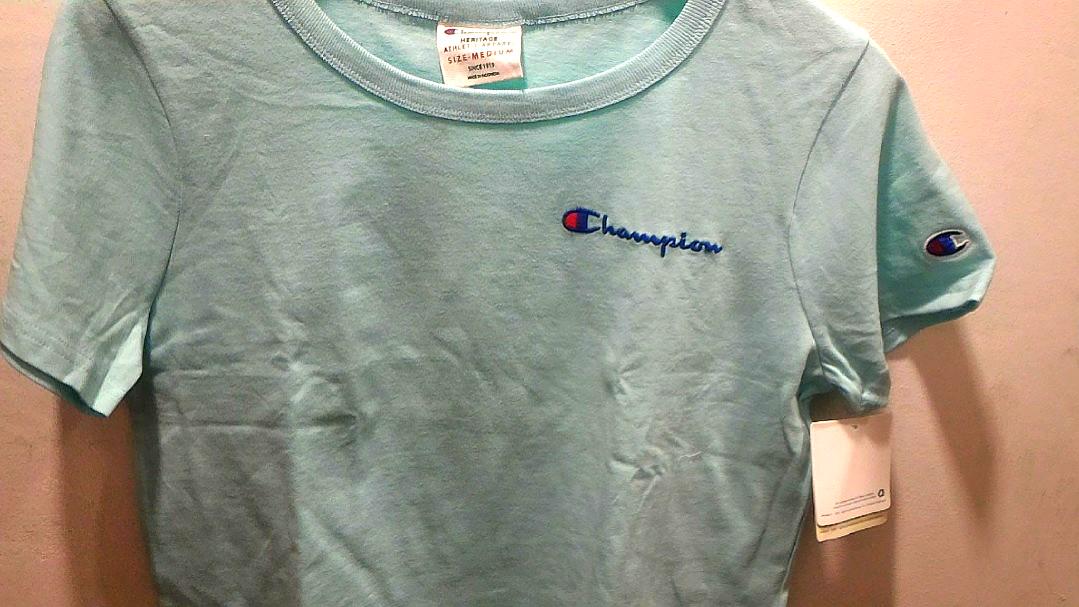 blue cropped champion shirt