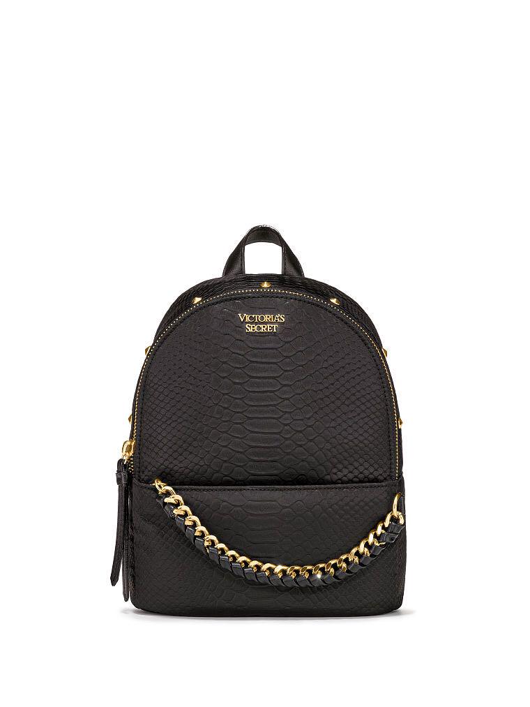 VS python stud Small City Backpack (Category: Bags & Wallets) located in Singapore. Submitted by saladcwa (Listing ID 184153993, Image 1). Description: Product Details New York, Paris, London—and beyond! This urban-inspired backpack is sized just right for all your city essentials. Main pocket fits: Wallet, phone and smaller daily essentials Small front zip pocket fits: Lip gloss and card case 1 interior multi-purpose pocket 7.3"L x 3.8"W x 9.7"H